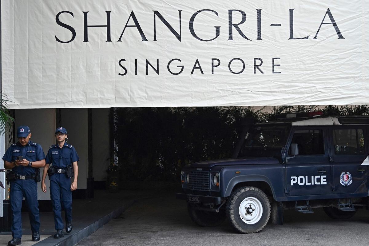 Policemen are seen at the Shangri-La Hotel during the 21st Shangri-La Dialogue summit in Singapore on May 31, 2024. 
