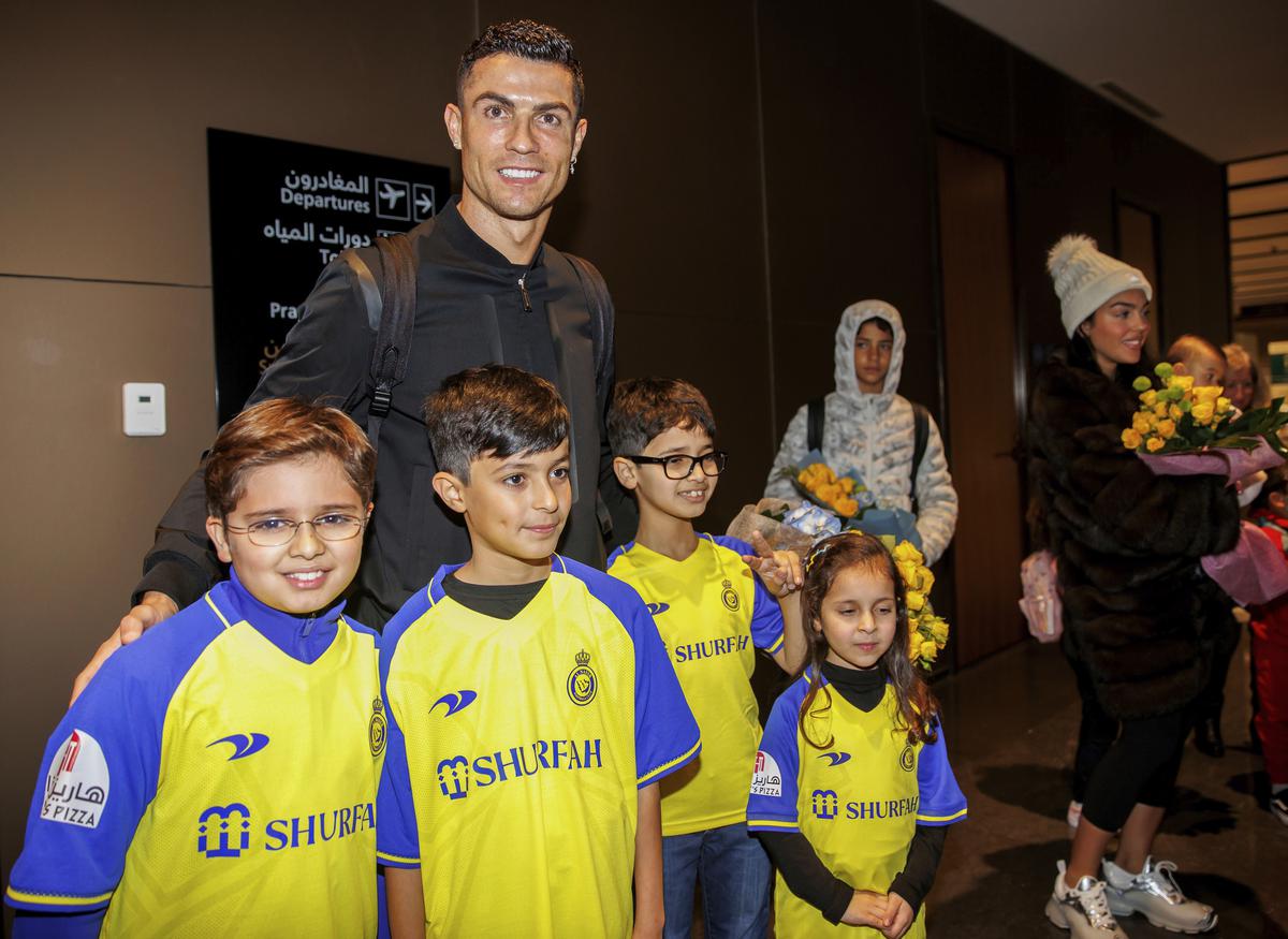 In this photo provided by Al Nassr Club, Cristiano Ronaldo arrives at Riyadh International Airport, late January 2, 2023