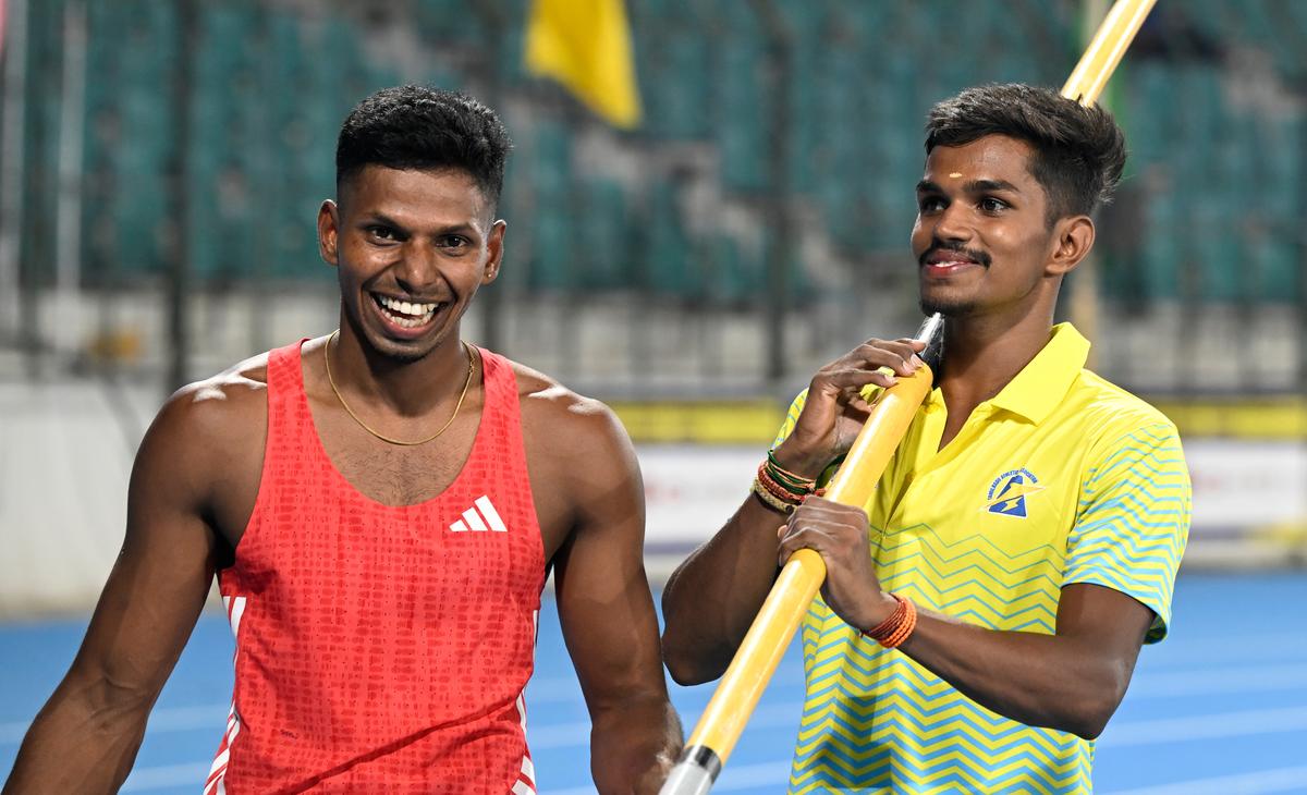 Reegan, left, and Gowtham after agreeing to share the pole vault crown at the 64th National Inter-State senior athletics championships in Chennai on Wednesday, August 20, 2025.