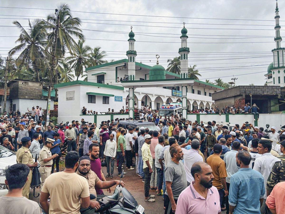People gather during the funeral of 32-year-old Abdul Rehman. People gather during the funeral of 32-year-old Abdul Rehman.