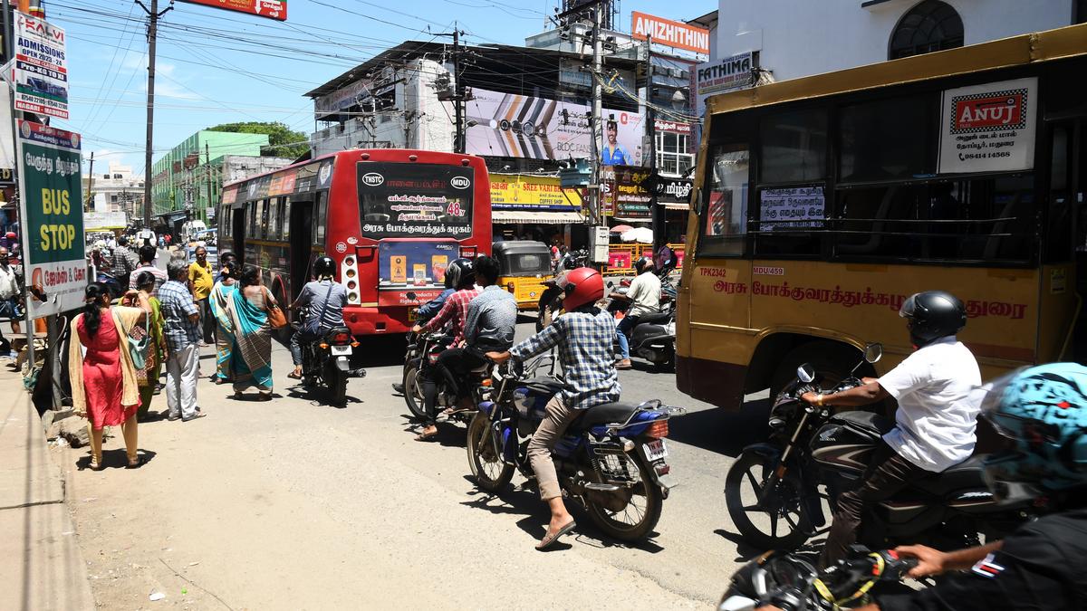 No bus shelter, long after traffic diversion