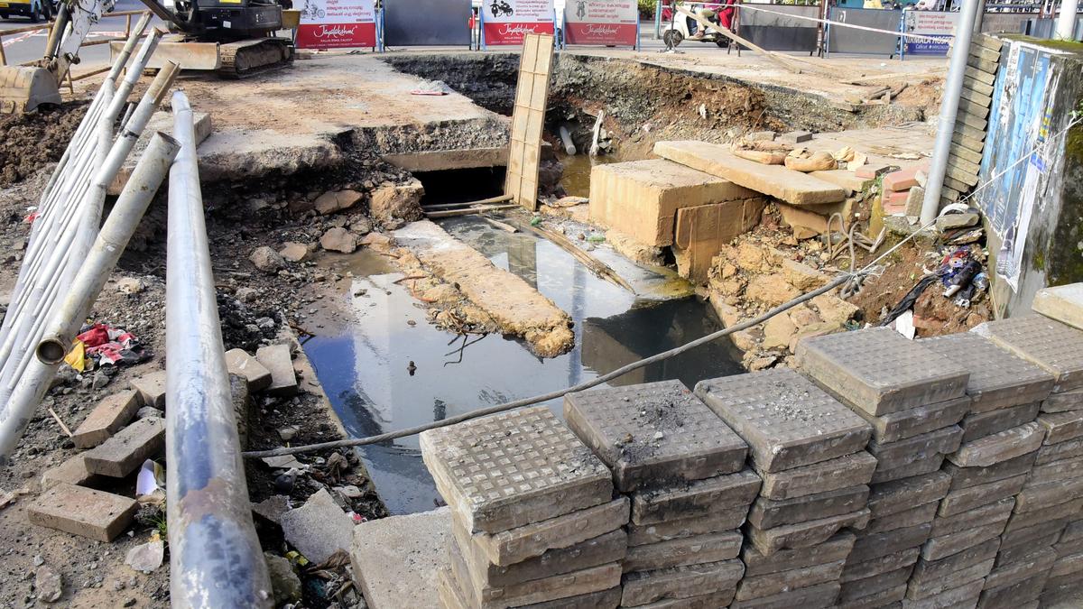 Water pipelines, electric cables hinder drain repair work at Stadium Junction