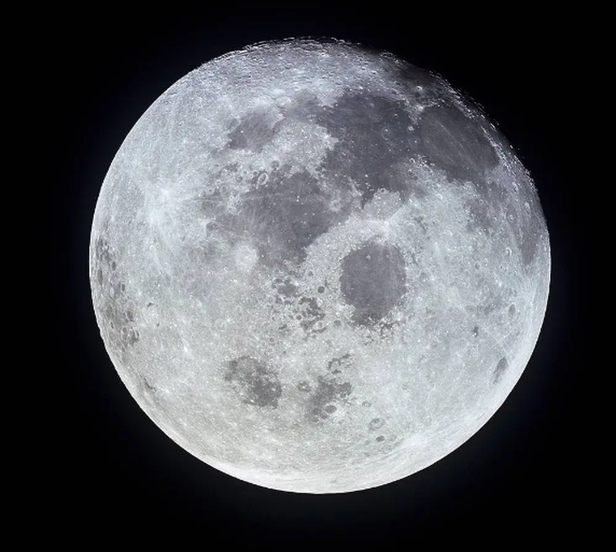 This outstanding view of the full moon was photographed from the Apollo 11 spacecraft during its trans-Earth journey homeward in 1969.