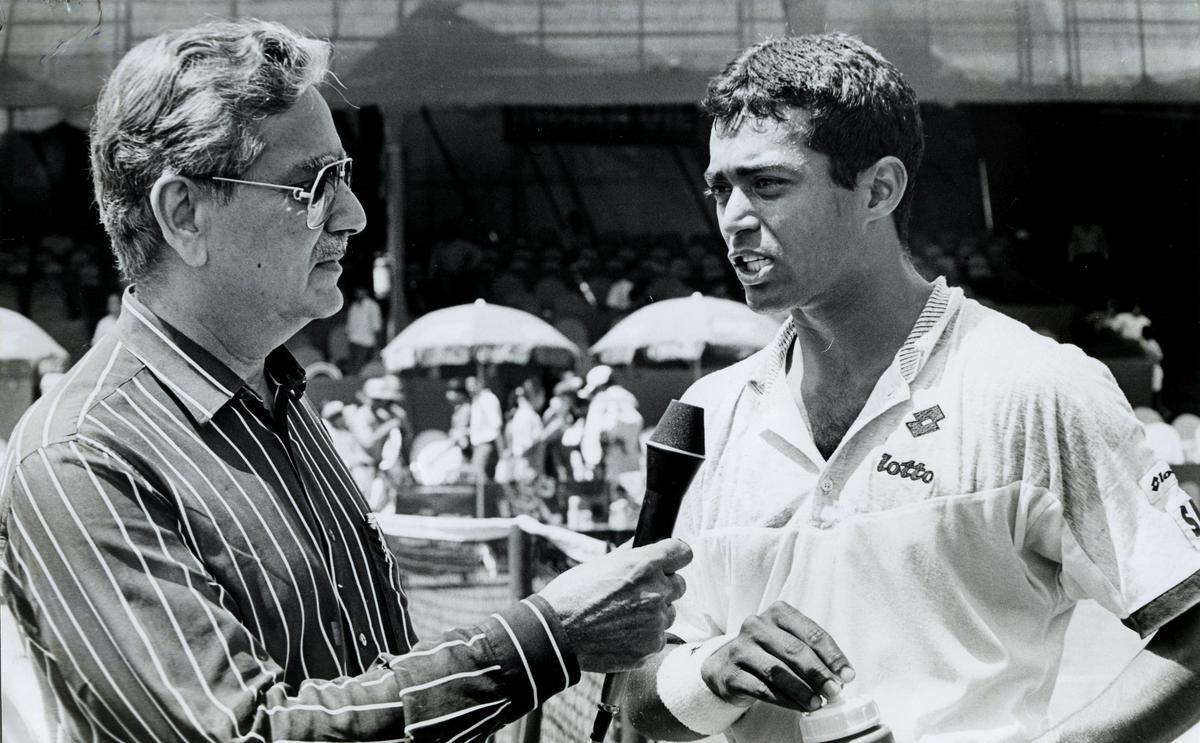 Leander Paes of India interviewed by Naresh Kumar during Asia-Oceania Group I Davis Cup tennis tie between India and Philippines at the National Sports Club of India (NSCI) courts in New Delhi on March 31, 1995.