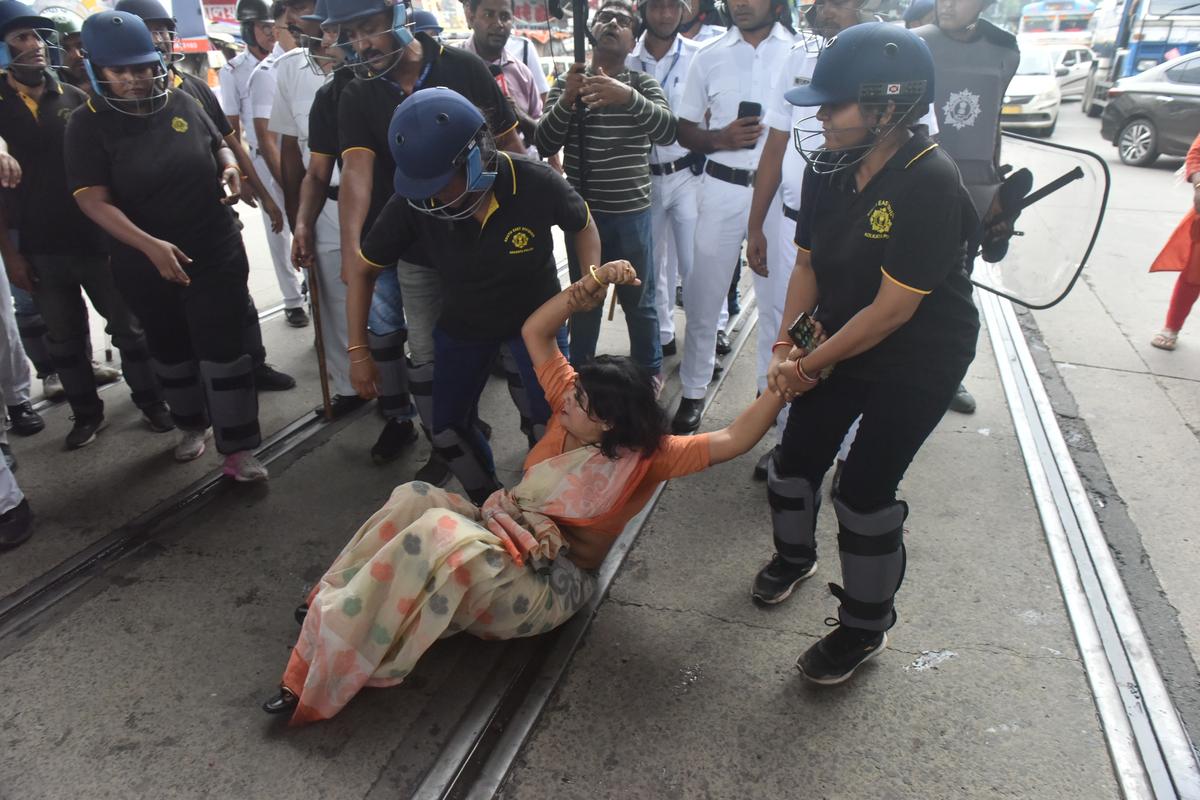 BJP protestors clash with police at the Gariahath crossing while protesting against the rape of a law student inside the South Calcutta Law College premises. 