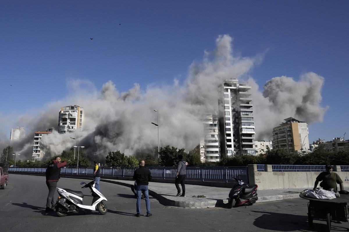 A picture clicked by AP photographer Bilal Hussein. Smoke rises from a building that was hit by an Israeli airstrike in Ghobeiri, Beirut, Lebanon, Tuesday, Oct. 22, 2024. 