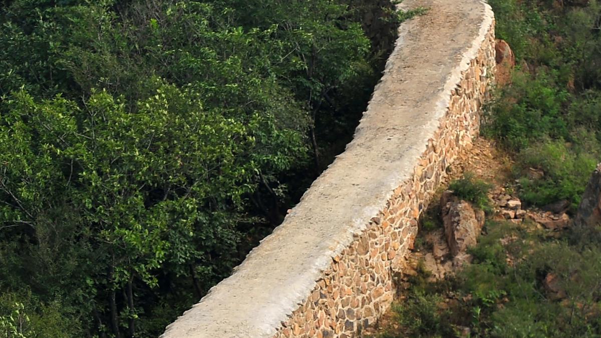 Two held after smashing hole in Great Wall of China