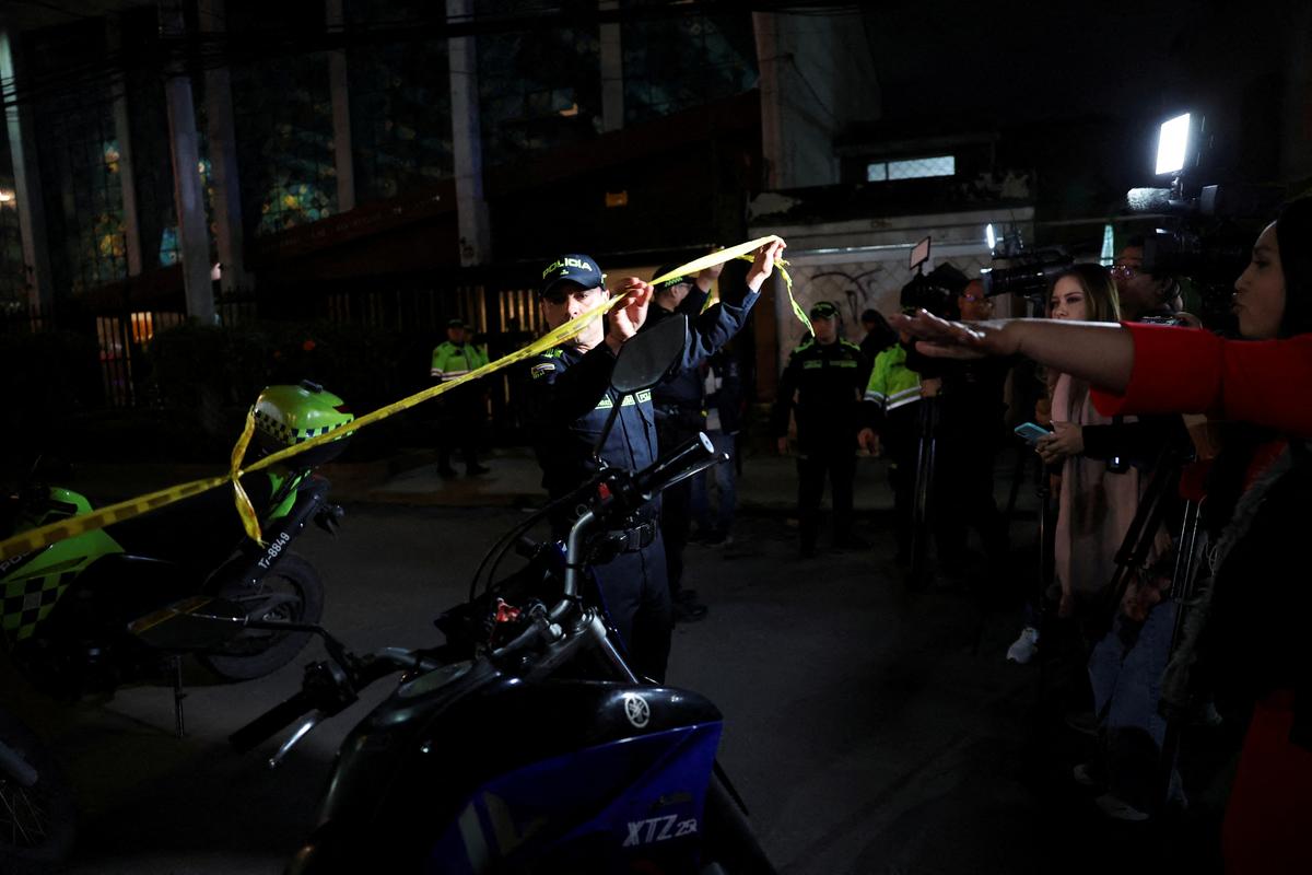 Police officers cordon off the area where Colombian Senator Miguel Uribe Turbay of the opposition Democratic Center party, was shot during a campaign event, in Bogota, Colombia, June 7, 2025.