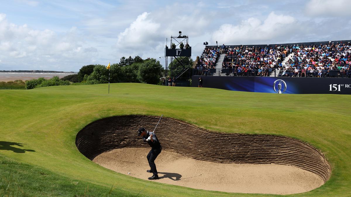 Harman eagles 18th as he soars into lead at British Open