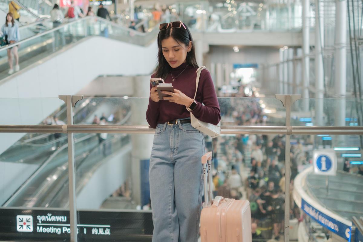 Passenger checking her flight status