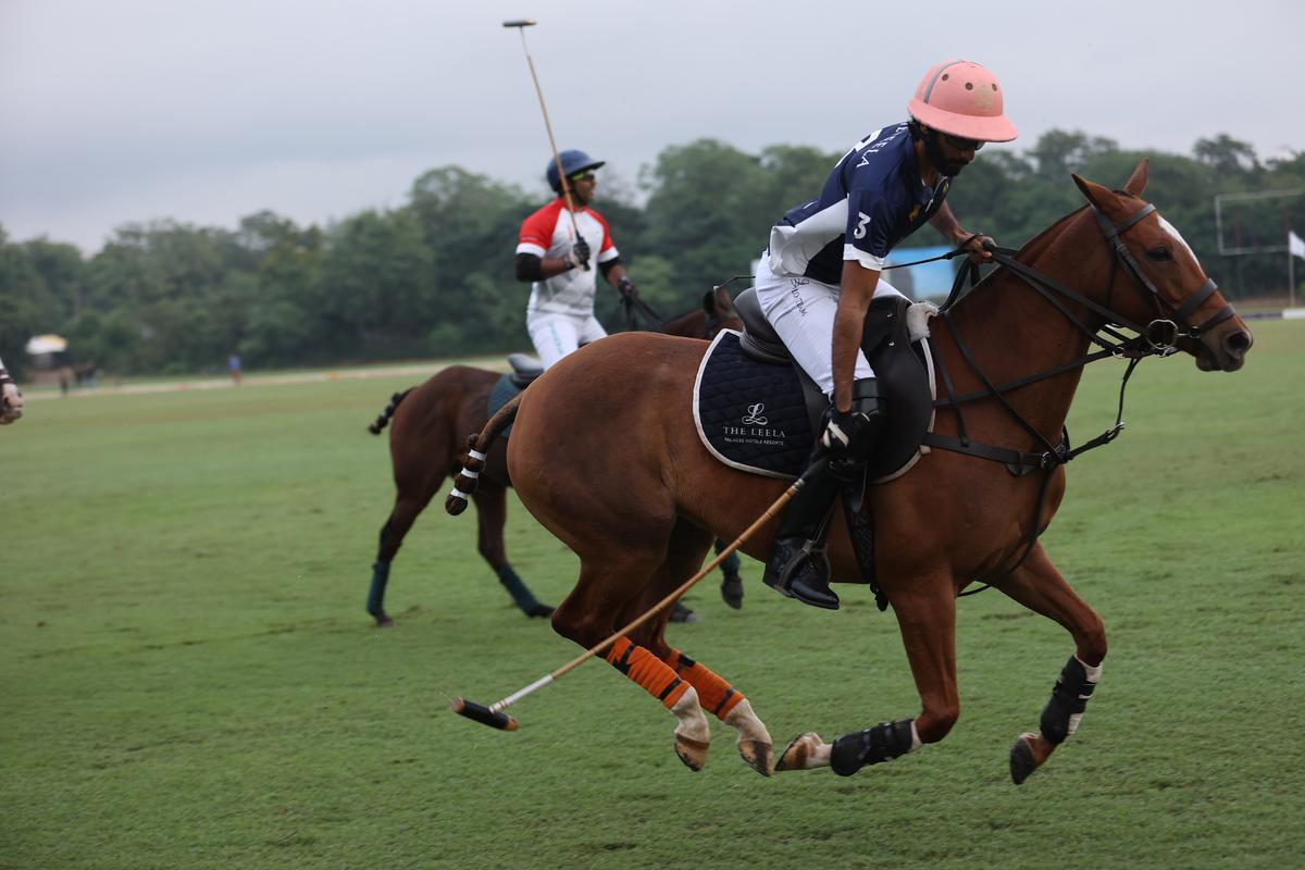 Sawai Padmanabh Singh takes a swing with his mallet at the Rajasthan Polo Club, Jaipur