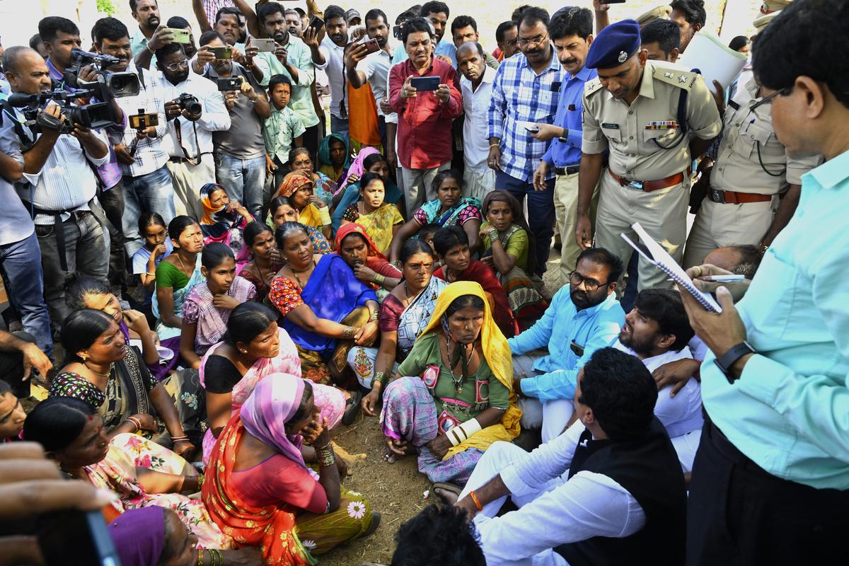 National ST commission member Jatoth Hussain Naik interacting with residents Roti Banda thanda in Dudyal mandal of Vikarabad district on November 18. 