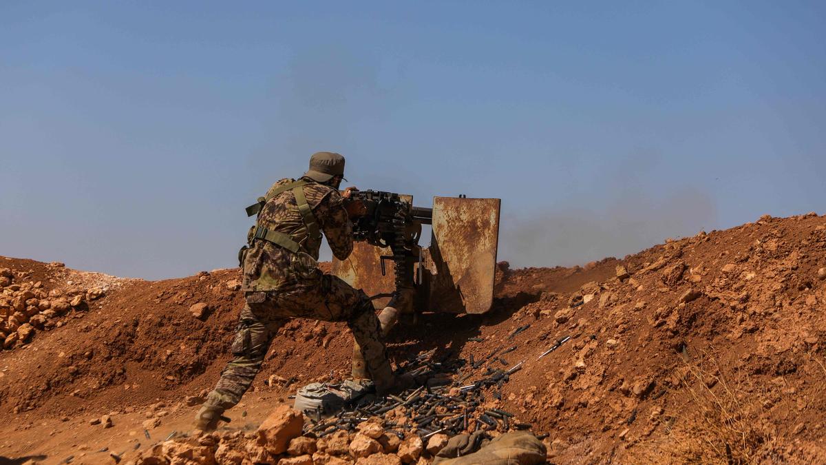 At least 25 dead as Damascus loyalists clash with Kurdish-led forces