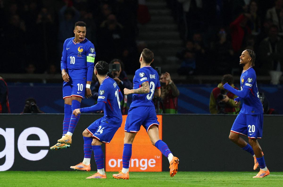 France's Kylian Mbappe celebrates scoring against Ukraine