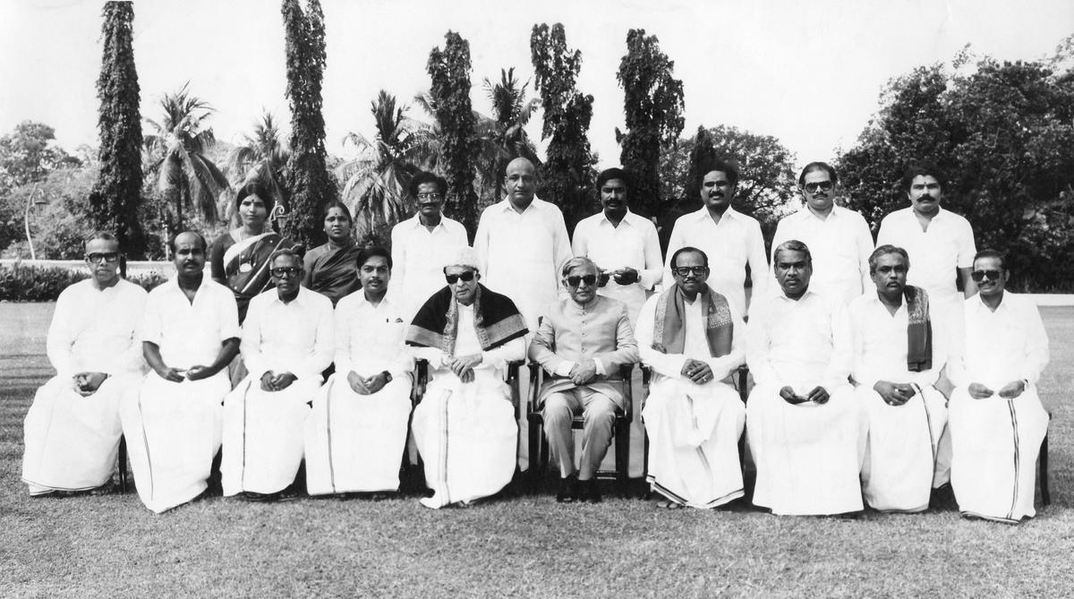 The Tamil Nadu Cabinet, after the swearing-in ceremony at the Raj Bhavan in Madras on February 15, 1985. Seated (from left) are: Dr. H.V. Hande, K. Kalimuthu, R.M. Veerappan, S. Ramachandran, Chief Minister M.G. Ramachandran, Governor S.L. Khurana, V. R. Nedunchezhian, K.A. Krishnaswamy, C. Aranganayagam and C. Ponnaiyan The Tamil Nadu Cabinet, after the swearing-in ceremony at the Raj Bhavan in Madras on February 15, 1985. Seated (from left) are: Dr. H.V. Hande, K. Kalimuthu, R.M. Veerappan, S. Ramachandran, Chief Minister M.G. Ramachandran, Governor S.L. Khurana, V. R. Nedunchezhian, K.A. Krishnaswamy, C. Aranganayagam and C. Ponnaiyan