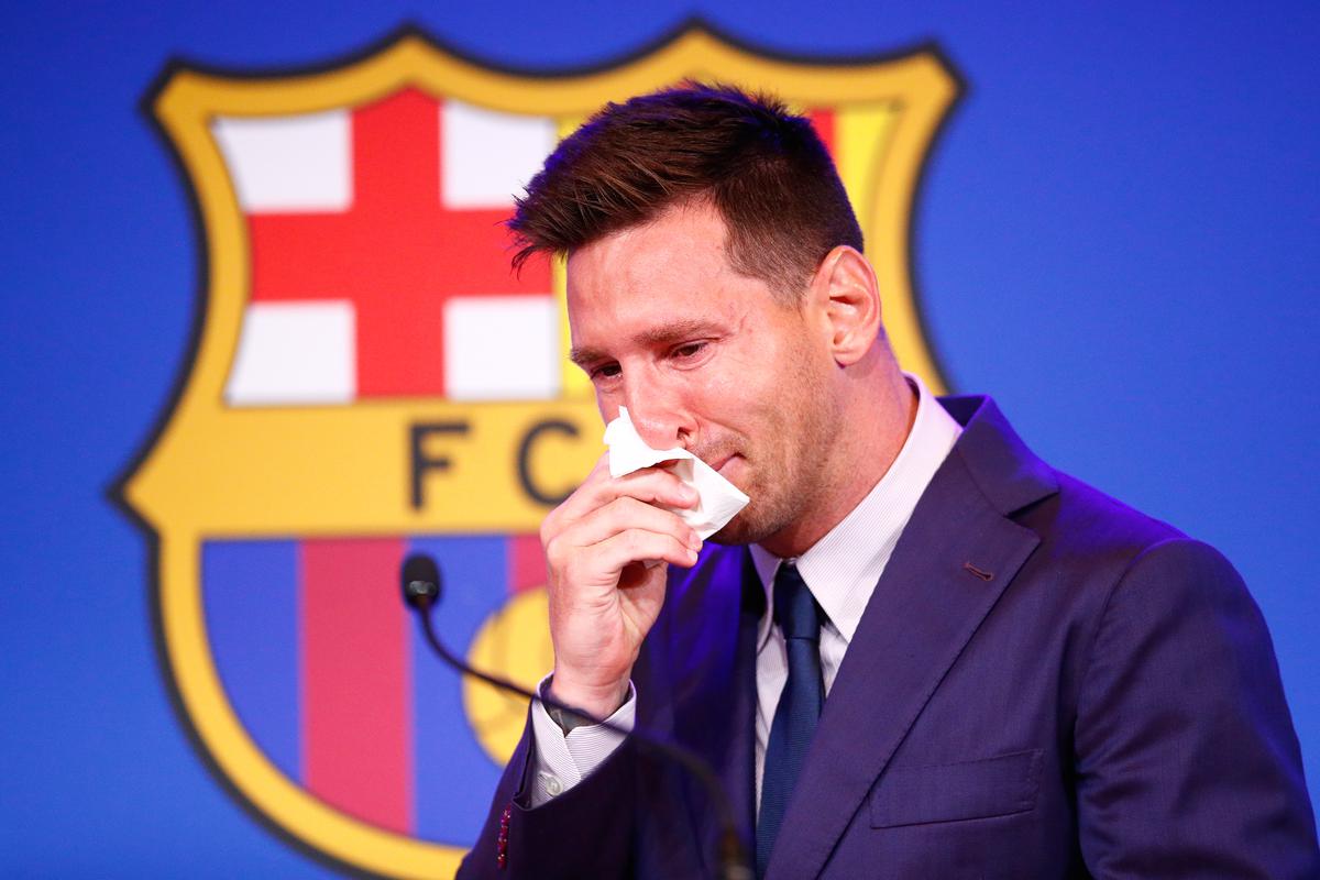 File picture of Lionel Messi tearing up during his farewell press conference at Barcelona’s Nou Camp on August 8, 2021