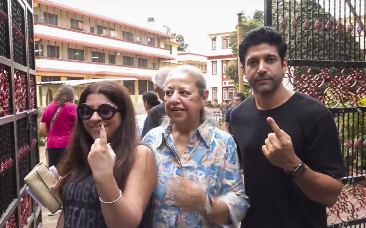 Bollywood actor Farhan Akhtar and film director Zoya Akhtar show their inked fingers after casting their votes during the fifth phase of Lok Sabha elections, in Mumbai