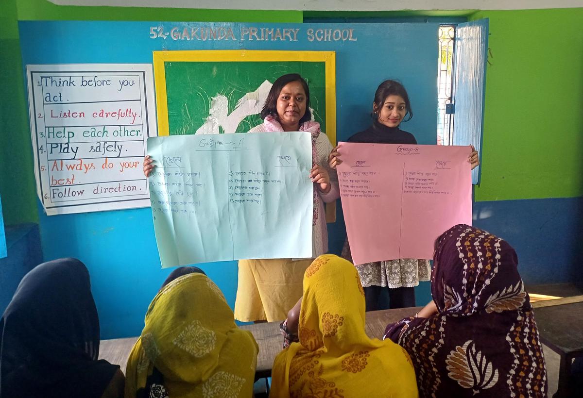 Sanchita Malo, a social worker and Mousumi Khatun, a Kanyashree Warrior during a workshop on Gender at  Gakunda Primary School at Bhakuri 2-gram panchayat in Behrampore block of Murshidabad district. The gram panchayat has been declared Child Marriage Free by the District authorities with no child marriage recorded in the past six months. 