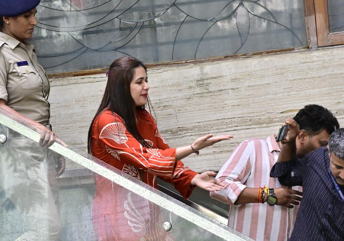 Pavitra Gowada being taken to custody from her residence at Rajarajeswari Nagar in Bengaluru on Thursday.