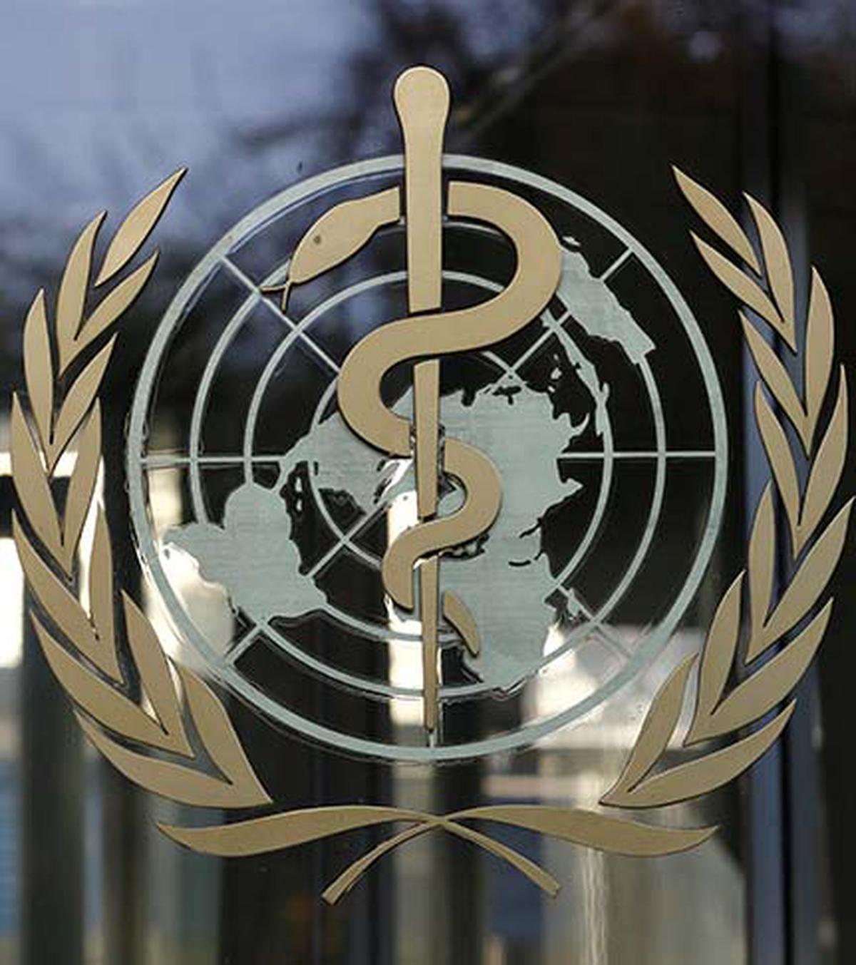 A logo is featured on the World Health Organization (WHO) headquarters in Geneva, Switzerland.  file