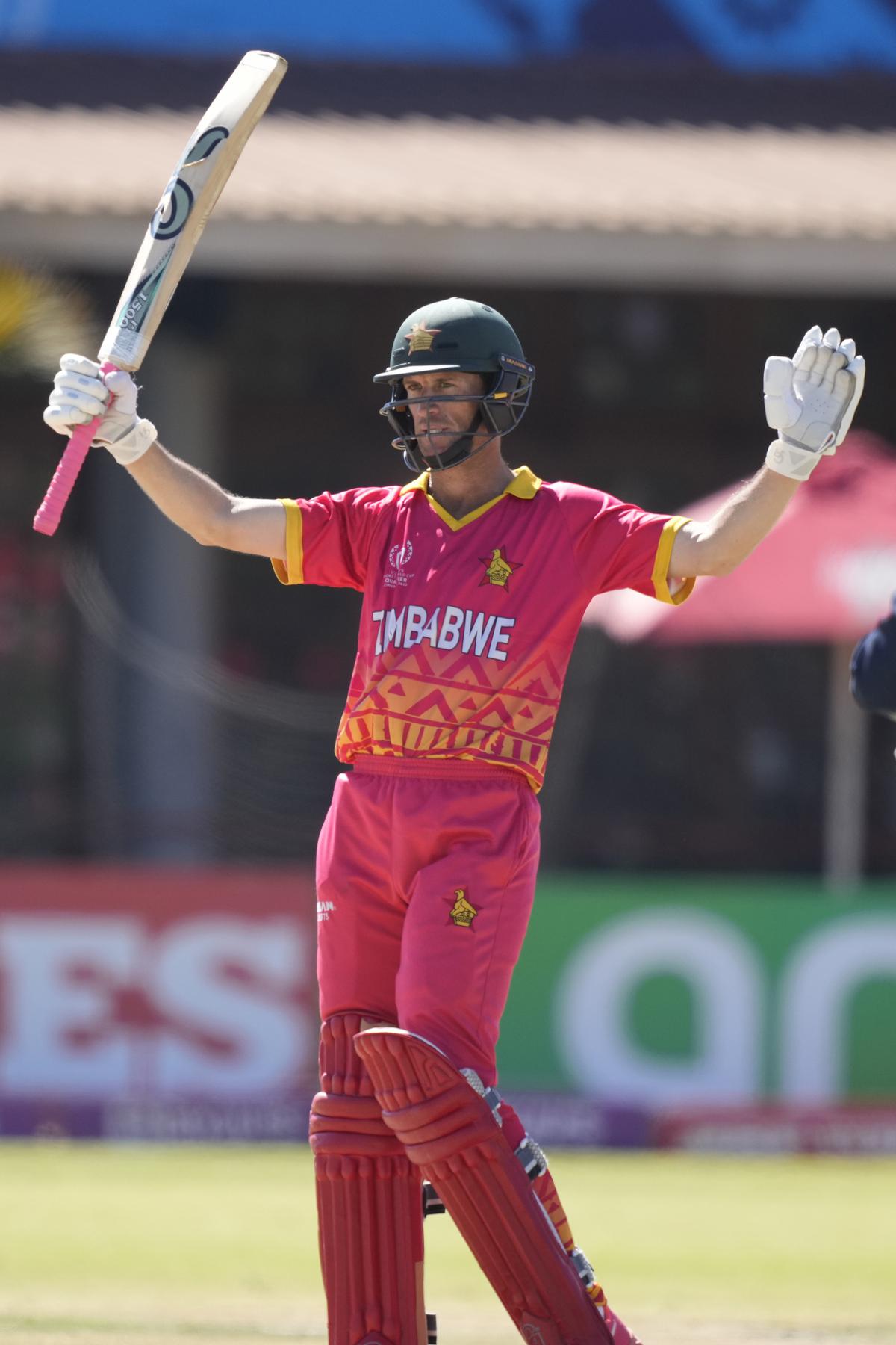 Zimbabwean batsman Sean Williams celebrates after scoring 150 runs during their ICC Men’s Cricket World Cup Qualifier match against the US at Harare Sports Club in Harare, Zimbabwe, Monday June, 26, 2023. 