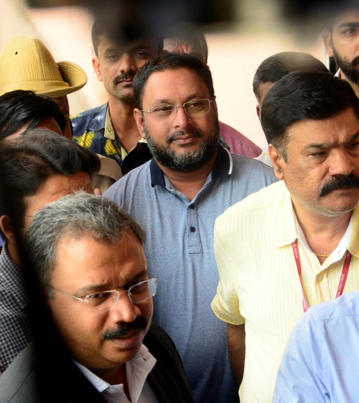 IMA chief Mansoor Khan being produced in court by Enforcement Directorate officials, in Bengaluru in July 2019.