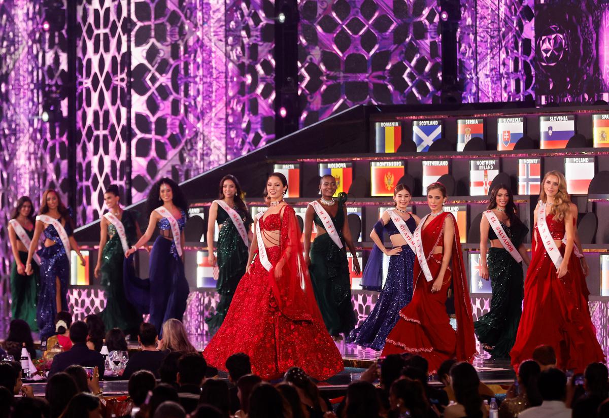 Participants walk the ramp during the 71st Miss World finale in Mumbai