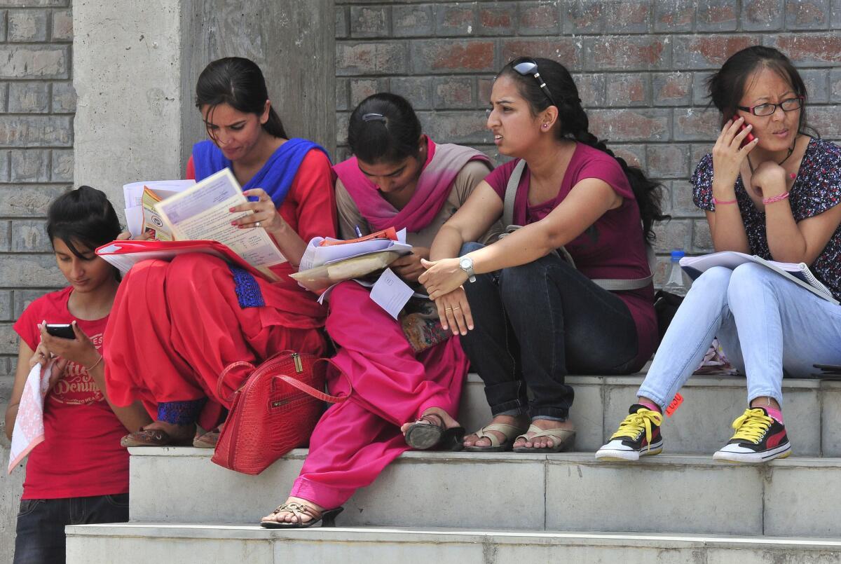 File photo of students filling admission forms in Punjab University. When the market demand for any particular course goes up, many private institutions immediately expand the admission intake in that course without following any cut-off norms. | Photo: Akhilesh Kumar/The Hindu