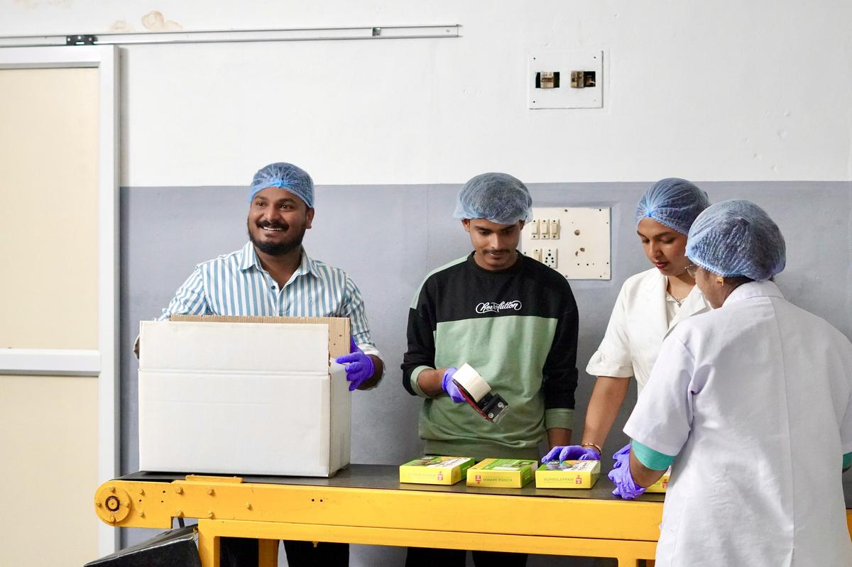 Akhil Bleeko (left) at his factory
