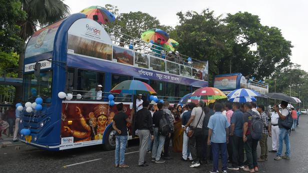 Doubled decker buses return to Kolkata along a planned route for Durga Puja