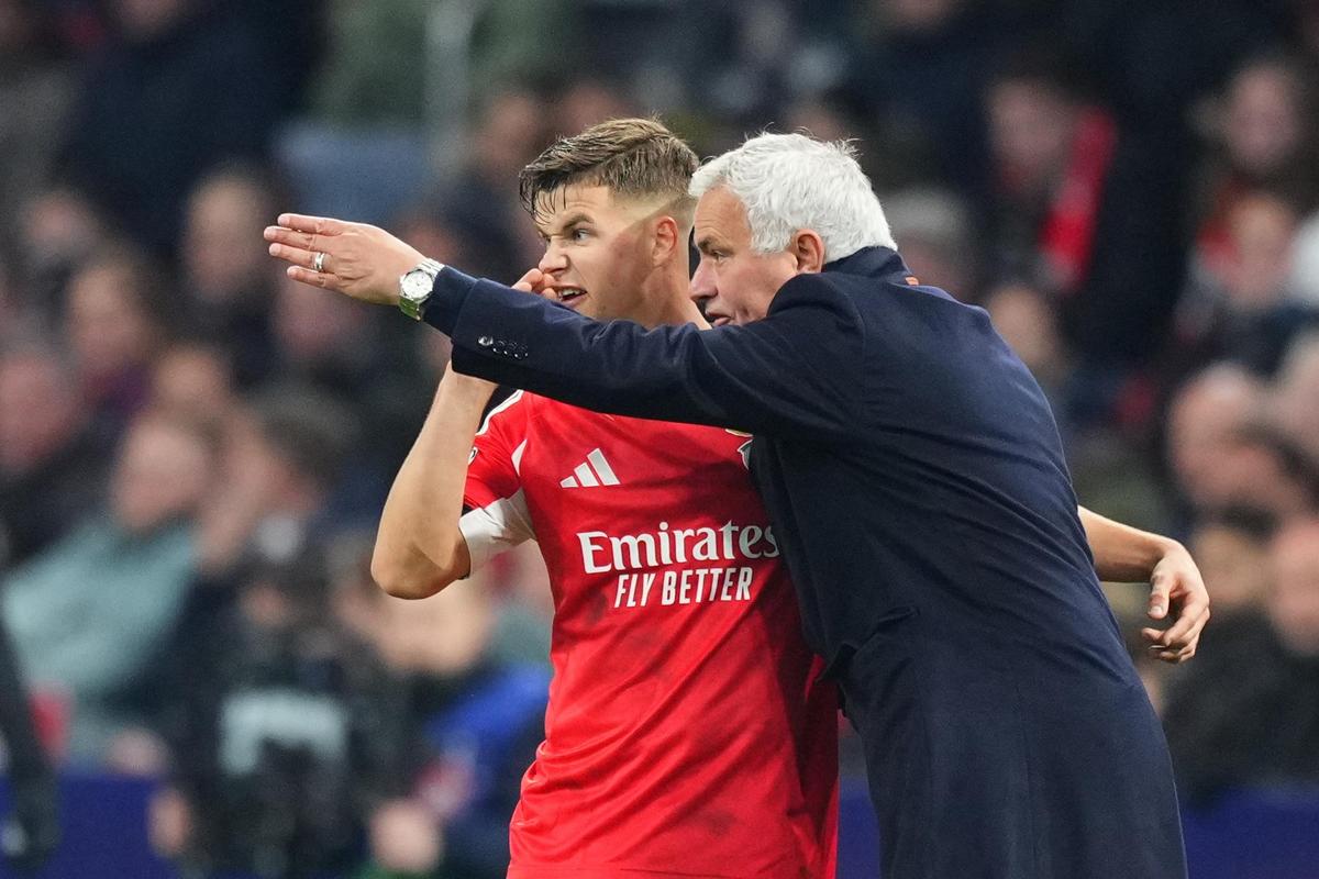 Benfica's head coach Jose Mourinho gives instructions to Benfica's Samuel Dahl, who scored against Ajax