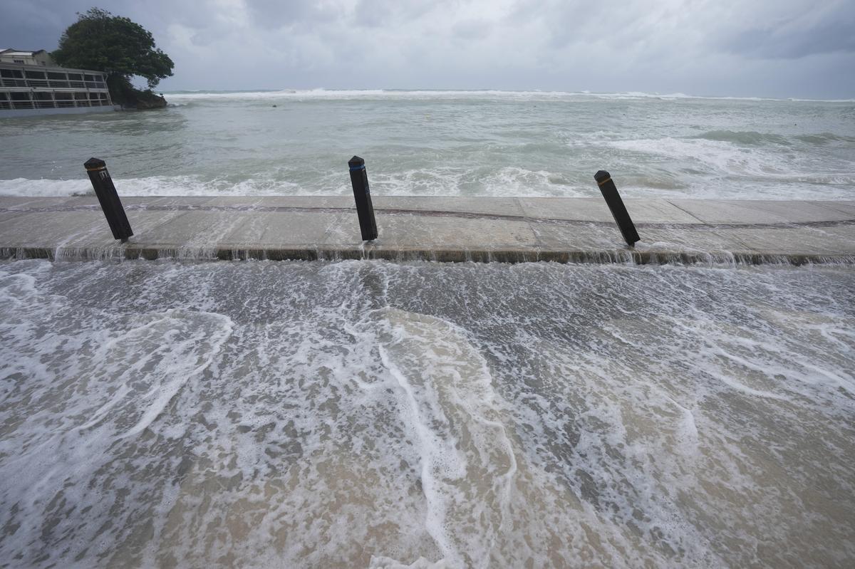 The sea floods the street after Hurricane Beryl passed through St. Lawrence, Barbados, on July 1, 2024