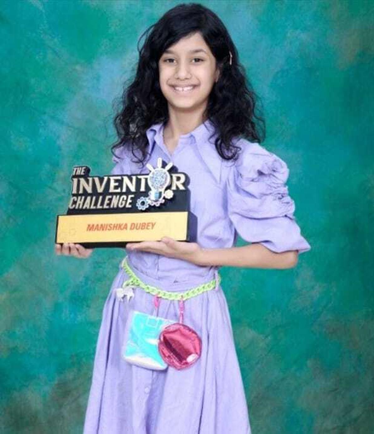 Manishka with her trophy from ‘The Inventor’s Challenge’. Manishka with her trophy from ‘The Inventor’s Challenge’.