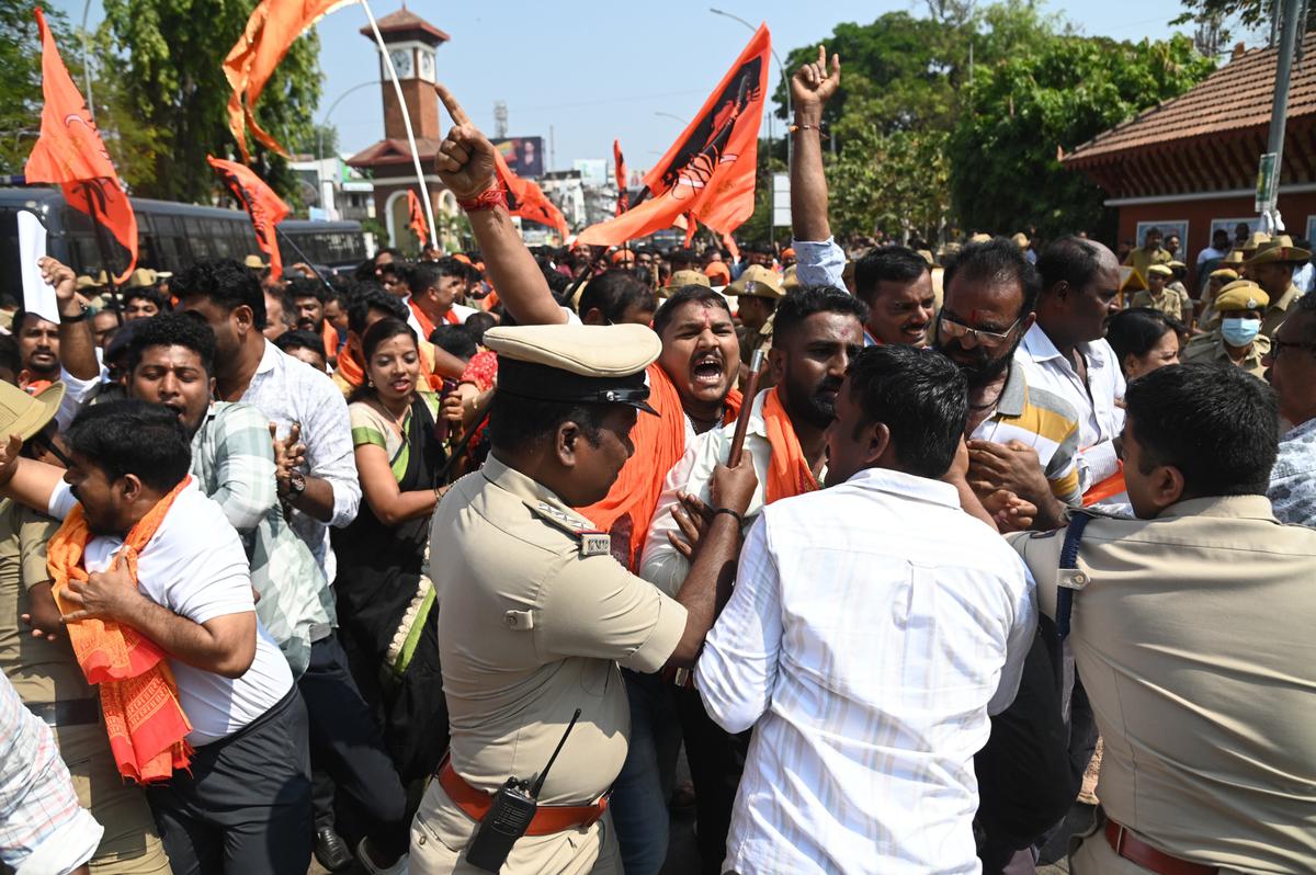 VHP members staging a protest at Clock Tower Circle in Mangaluru on Monday.