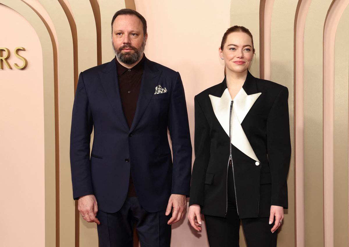 Director Yorgos Lanthimos, nominated for Best Director, and Emma Stone, nominated for Best Actress in a Leading Role, for ‘Poor Things,’ which is also nominated for Best Picture, attend the Nominees Luncheon