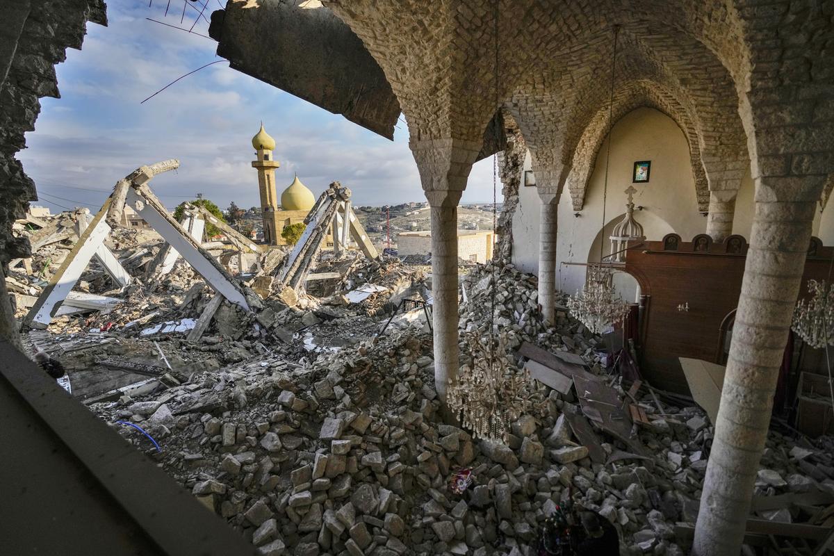 A mosque is seen from St. George Melkite Catholic Church that was destroyed by Israeli airstrike, in the town of Dardghaya in southern Lebanon, December 22, 2024.