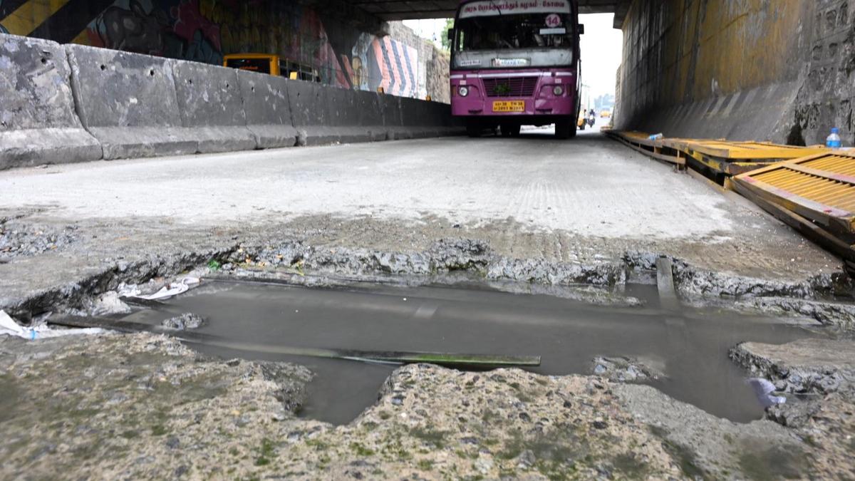 Motorists seek repair works to road under bridge at Kollampalayam