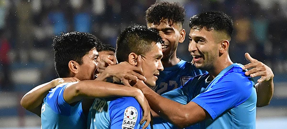 Indian captain Sunil Chhetri celebrates with teammates after scoring against Pakistan in the SAFF Championship 2023 at the Kanteerava Stadium, in Bengaluru on June 21, 2023.  