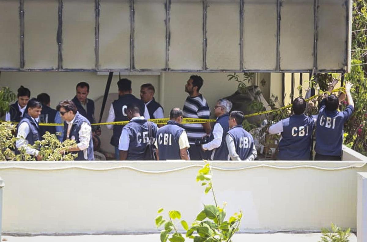 Central Bureau of Investigation (CBI) officials recreate the crime scene in Twisha Sharma death case, at the accused Giribala Singh's residence, in Bhopal, Madhya Pradesh, on June 1, 2026. Model-actress Twisha Sharma's husband Samarth Singh, in striped tshirt, also seen.