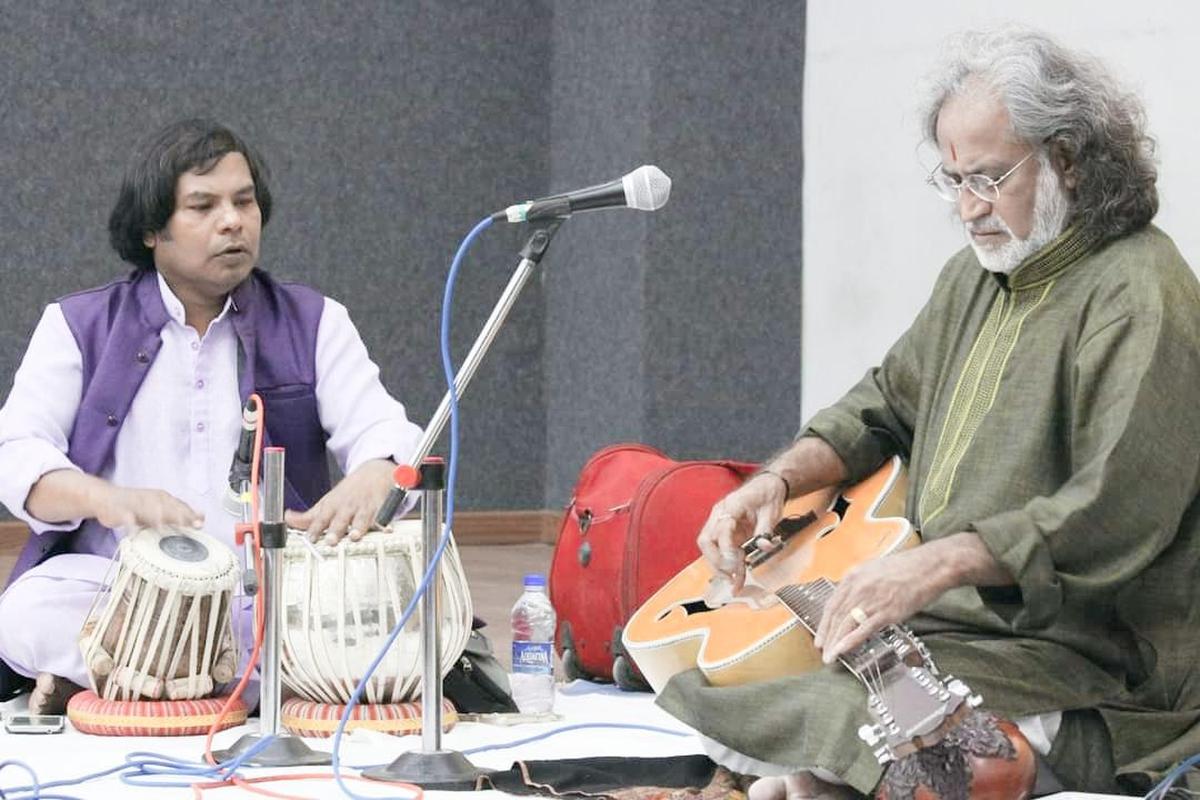 Performing at a concert with pandit Vishwa Mohan Bhatt 