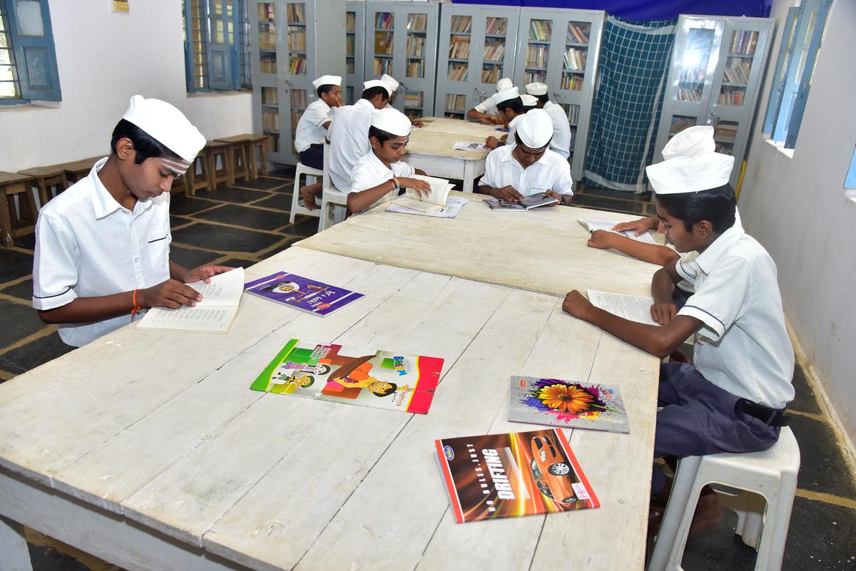 The students studying in their school library.  