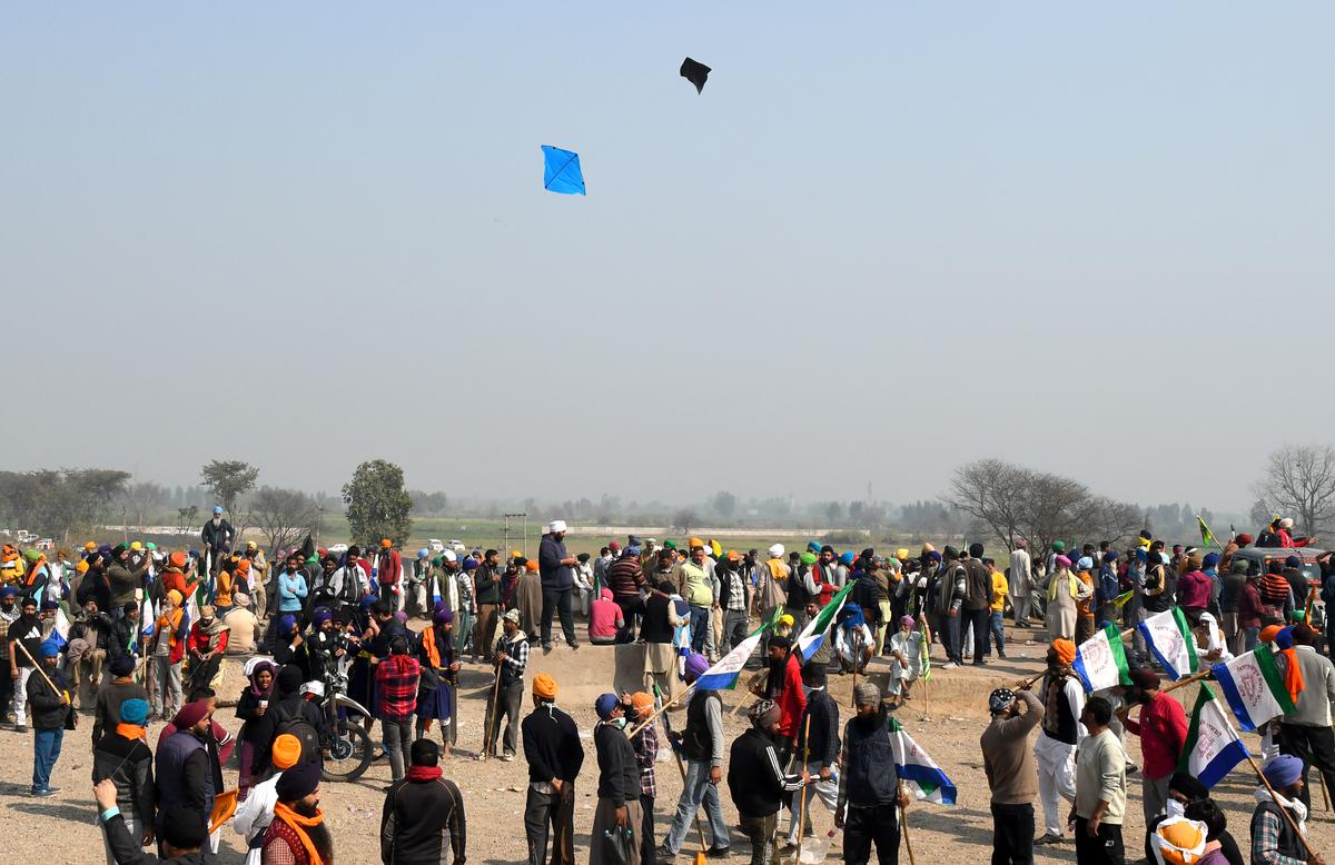 Farmers fly kites at Shambhu Barrier in Punjab on February 14, 2024. 