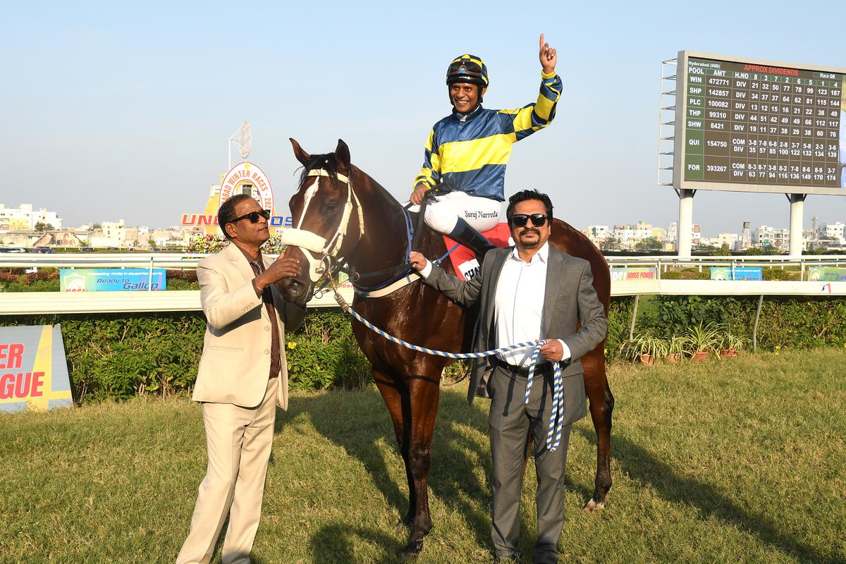 Champions Way’s owner Teja Gollapudi, right, and trainer S. Narredu leading in the champion colt (Suraj Narredu) after the success in the HPSL Golconda Derby Stakes on Sunday, January 28, 2024. 