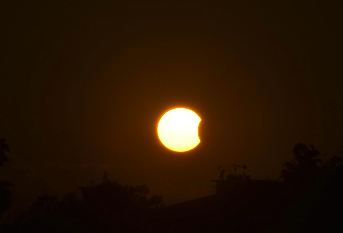 Ranchi: The moon partially covers the sun during the partial solar eclipse in Ranchi, Tuesday, Oct 25, 2022. 