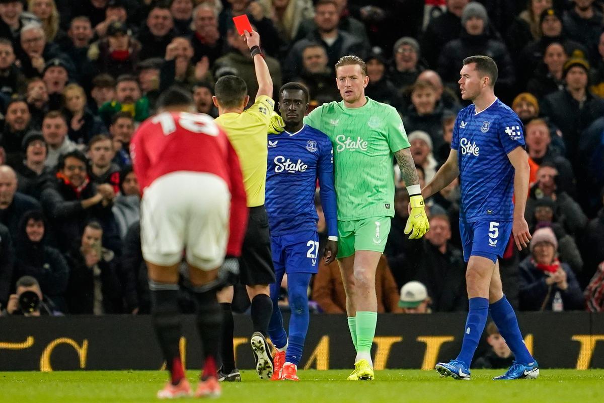 Everton's Idrissa Gueye, third right, gets a red card during the English Premier League soccer match between Manchester United and Everton in Manchester, England, on November 24, 2025