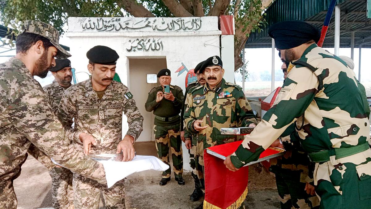 BSF, Pakistan Rangers exchange sweets along International Border in Jammu on Republic Day