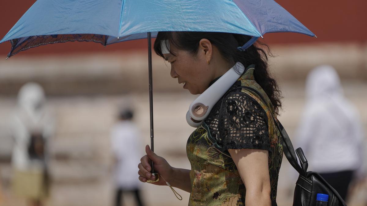 Nine missing in China landslide sparked by heavy rains amid flooding, searing temperatures