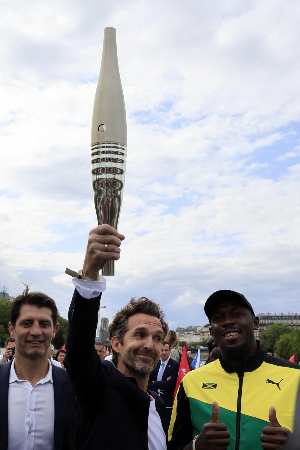 Peacethemed torch unveiled for Paris 2025 Olympics