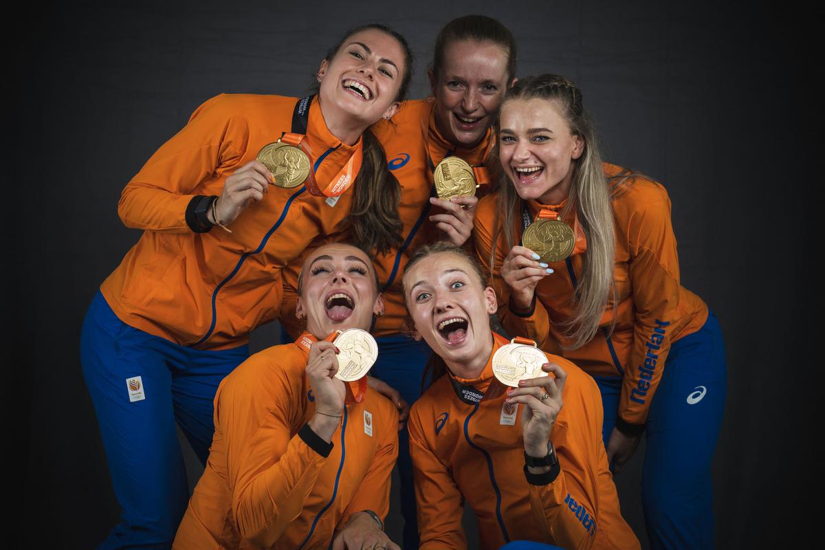Women’s 4x400m relay gold medallists (front from L) Netherlands’ Lieke Klaver, Femke Bol (back from L)  Eveline Saalberg,  Cathelijn Peeters and Lisanne de Witte pose for portraits during a studio photo session on the sidelines of the World Athletics Championships in Budapest. 