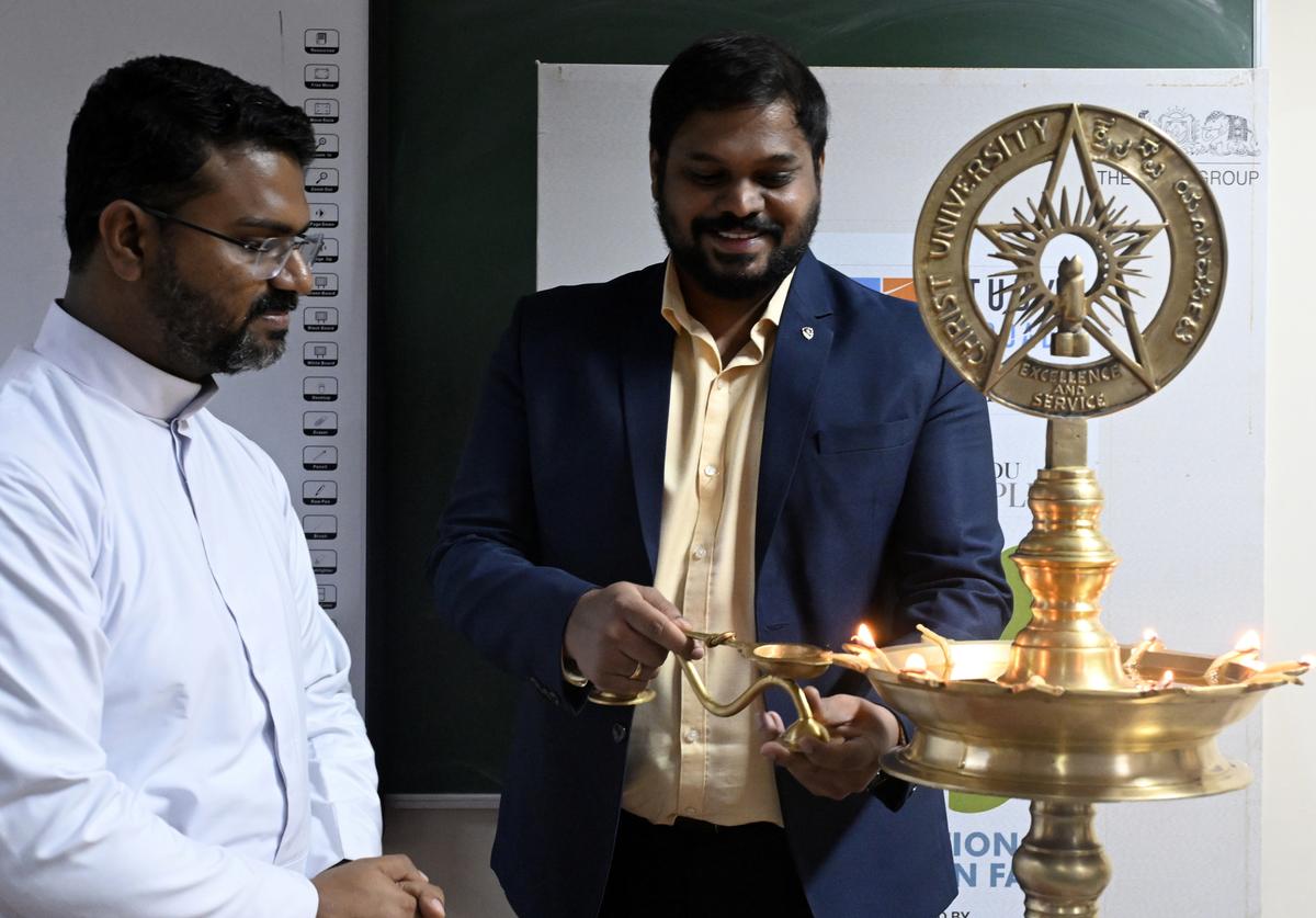 Fr. Shijin Director of the School of Engineering and Technology, Kengeri, and Sunil Manjappa, Branch Manager Bengaluru FES Study abroad powered by Fragomen inaugurating The Hindu EducationPlus International Education Fair at Christ University, Kengeri, in Bengaluru on Tuesday. August 20.   